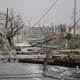 Electricity poles and lines lay toppled on the road after Hurricane Maria hit the eastern region of the island, in Humacao, Puerto Rico. (Image: AP)